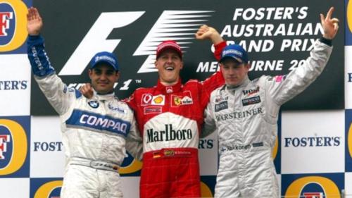 Ο Schumacher στο βάθρο του Grand Prix της Αυστραλίας το 2002 με τους Juan Pablo Montoya (αριστερά) και Kimi Raikkonen