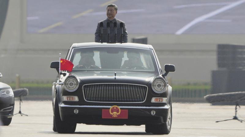 Xi