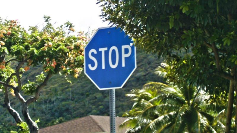 blue stop sign