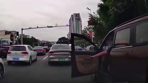 Man opens car door 2