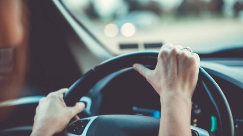 woman driver steering wheel